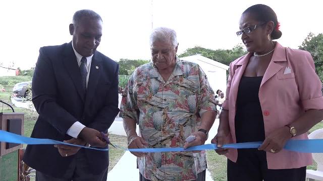 (L-r) Premier of Nevis Hon. Vance Amory cutting the ribbon to officially launch the hotel’s extension of 12 rooms at a dedication ceremony on October 14, 2016, with Co-owner of the Mount Nevis Hotel Dr. Adly Meguid and Hotel Manager Jeanette Grell-Hull
